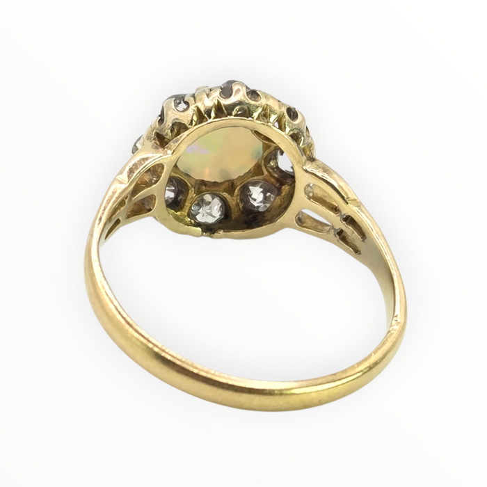 2777: 18ct Gold White Opal Diamonds Flower Head Ring