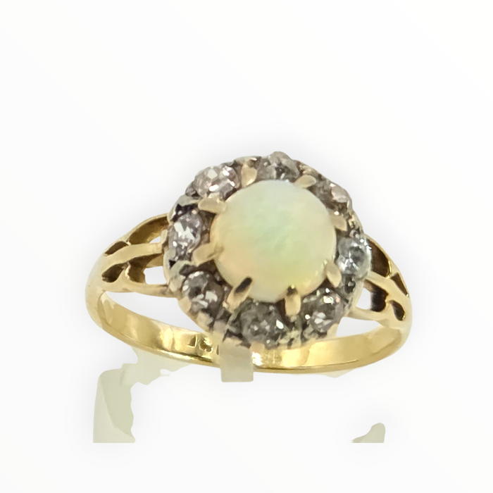 2777: 18ct Gold White Opal Diamonds Flower Head Ring