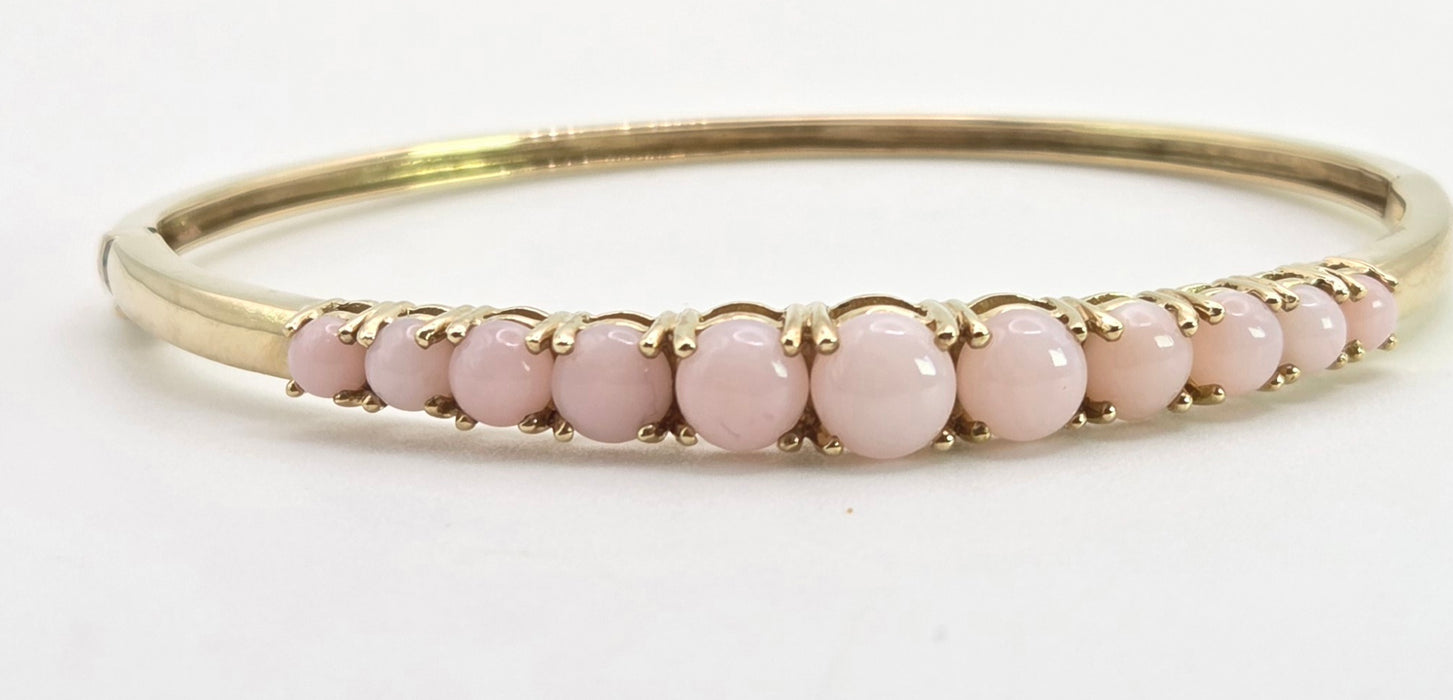 2958: Vintage: 9ct Gold Eleven Pink Opals Bangle