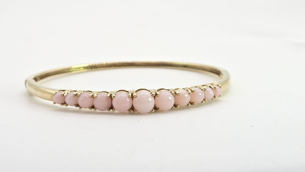 2958: Vintage: 9ct Gold Eleven Pink Opals Bangle
