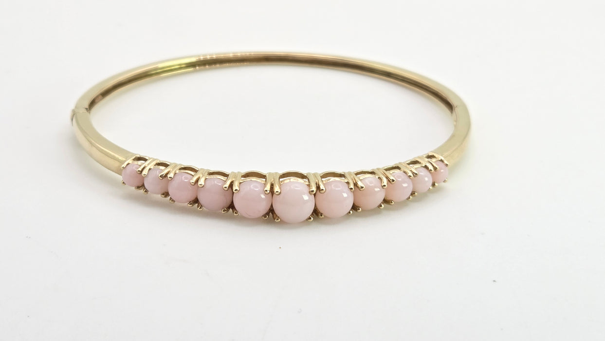2958: Vintage: 9ct Gold Eleven Pink Opals Bangle