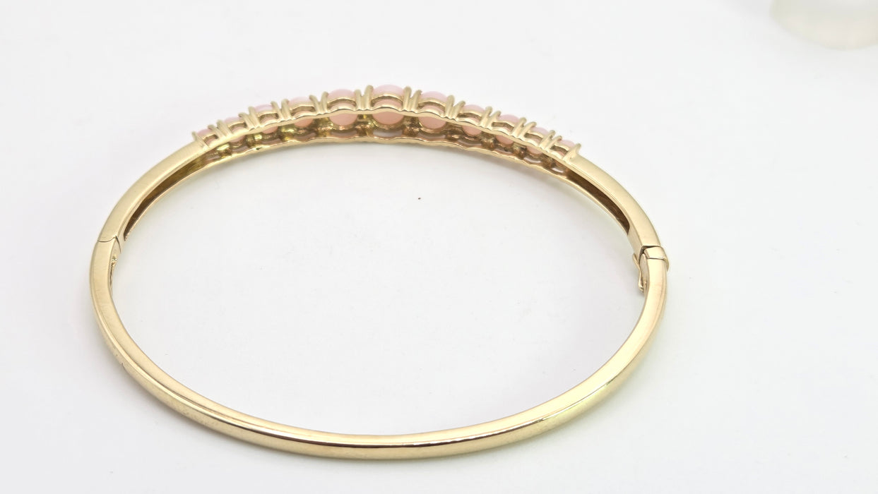 2958: Vintage: 9ct Gold Eleven Pink Opals Bangle