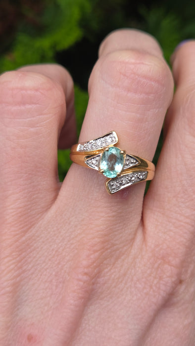 6416: 18ct Gold Blue Aquamarine  Diamonds Bypass Cocktail Ring