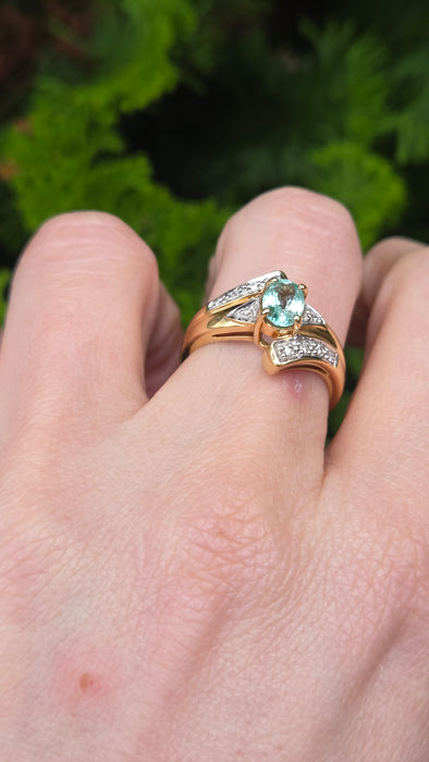 6416: 18ct Gold Blue Aquamarine  Diamonds Bypass Cocktail Ring