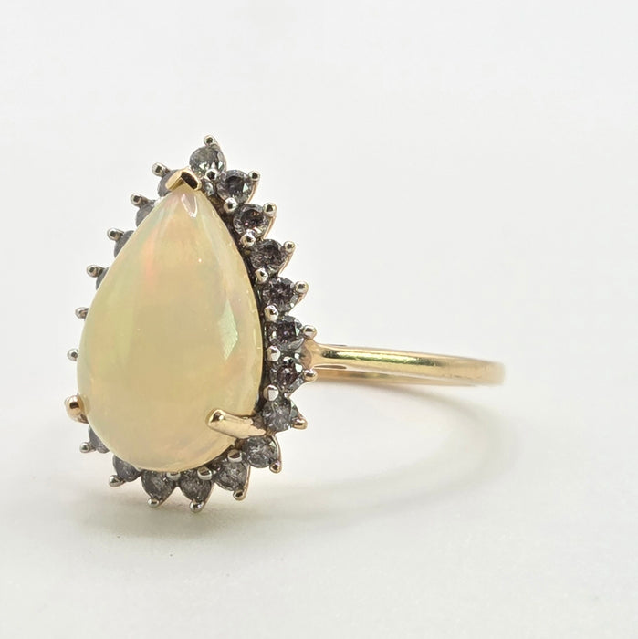 2899: Vintage 9ct Gold Pear Cut White Opal 21 Natural Diamonds Ring