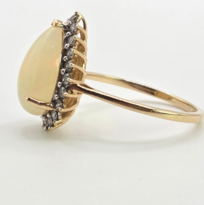 2899: Vintage 9ct Gold Pear Cut White Opal 21 Natural Diamonds Ring