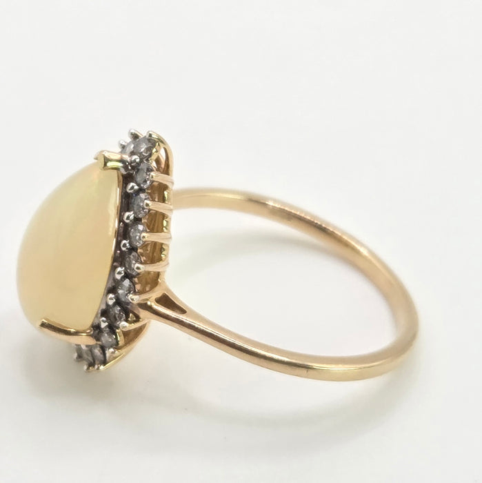 2899: Vintage 9ct Gold Pear Cut White Opal 21 Natural Diamonds Ring