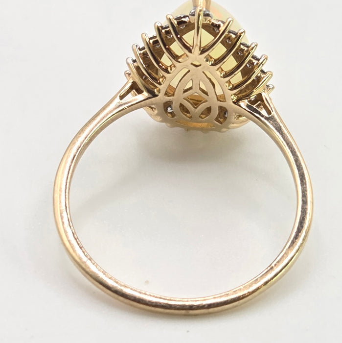2899: Vintage 9ct Gold Pear Cut White Opal 21 Natural Diamonds Ring