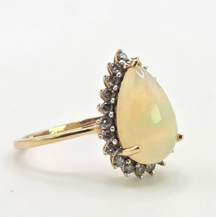 2899: Vintage 9ct Gold Pear Cut White Opal 21 Natural Diamonds Ring