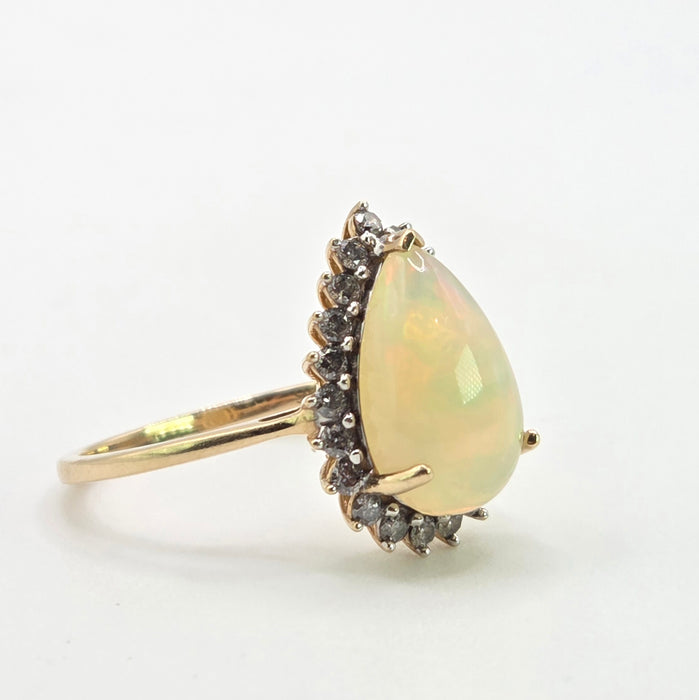 2899: Vintage 9ct Gold Pear Cut White Opal 21 Natural Diamonds Ring