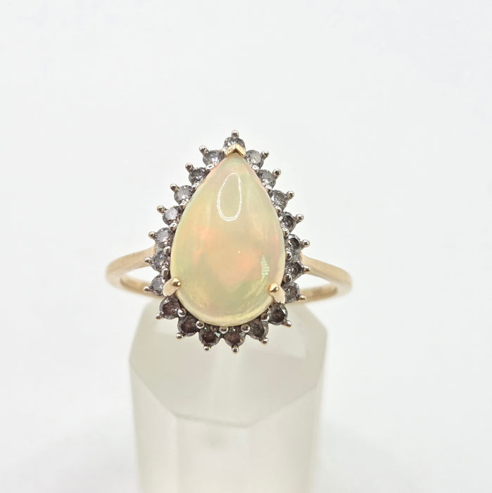 2899: Vintage 9ct Gold Pear Cut White Opal 21 Natural Diamonds Ring