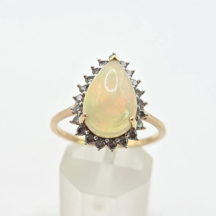 2899: Vintage 9ct Gold Pear Cut White Opal 21 Natural Diamonds Ring