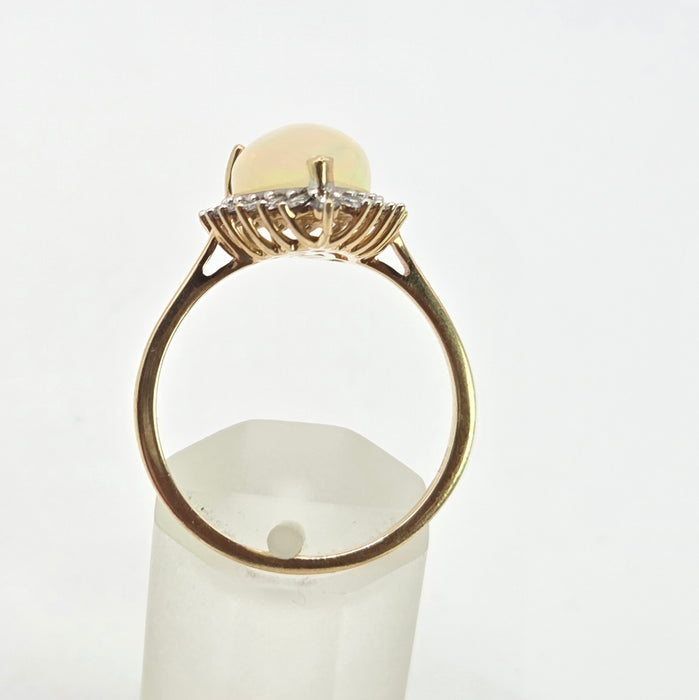 2899: Vintage 9ct Gold Pear Cut White Opal 21 Natural Diamonds Ring