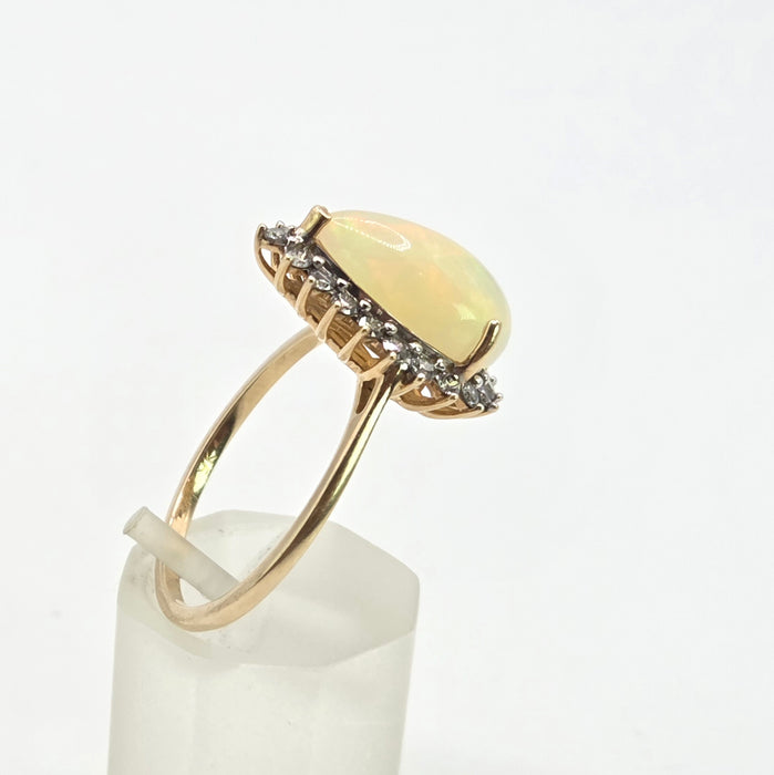 2899: Vintage 9ct Gold Pear Cut White Opal 21 Natural Diamonds Ring