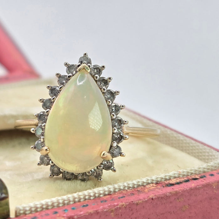 2899: Vintage 9ct Gold Pear Cut White Opal 21 Natural Diamonds Ring