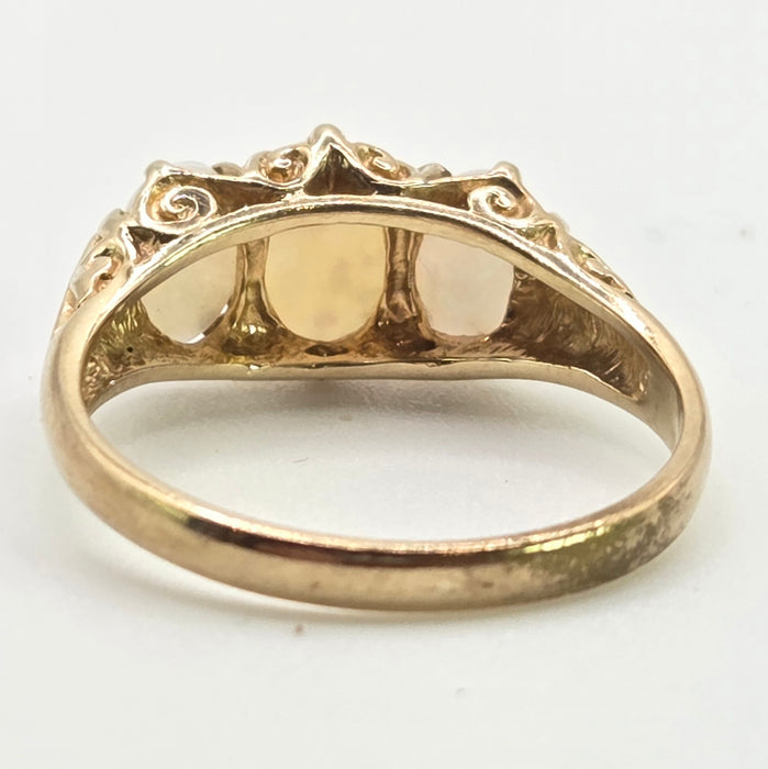 2983: Vintage Classic 9ct Gold White Opals Trilogy Rimg