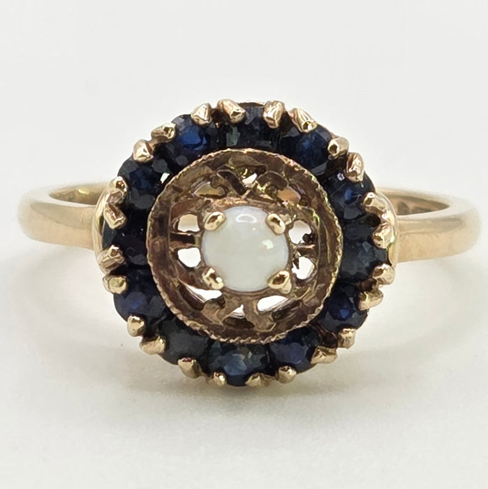 2858: Vintage 9ct Gold White Opal 12 Blue Sapphires Openwork Ring- From 1971