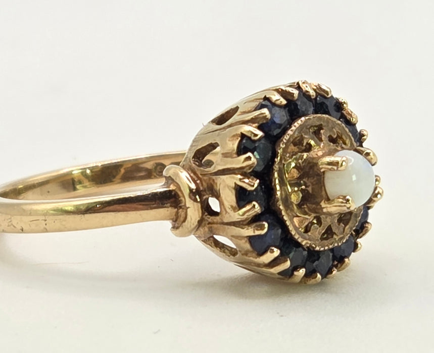 2858: Vintage 9ct Gold White Opal 12 Blue Sapphires Openwork Ring- From 1971