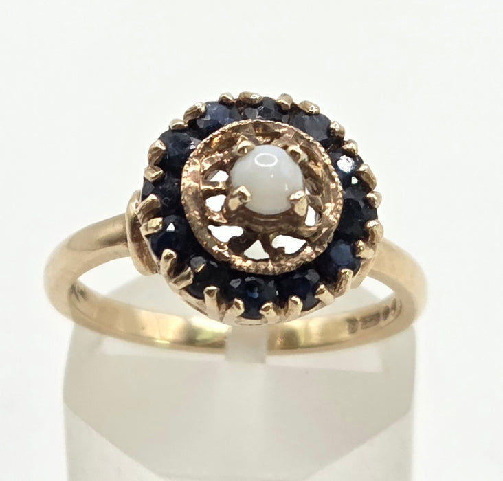 2858: Vintage 9ct Gold White Opal 12 Blue Sapphires Openwork Ring- From 1971