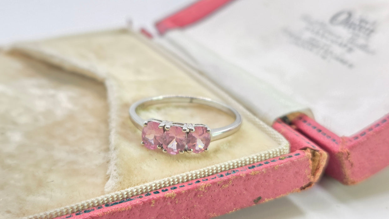 2860: Vintage 9ct White Gold Pink Sapphires Trilogy Ring