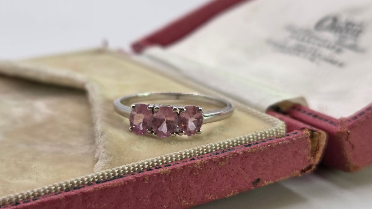 2860: Vintage 9ct White Gold Pink Sapphires Trilogy Ring