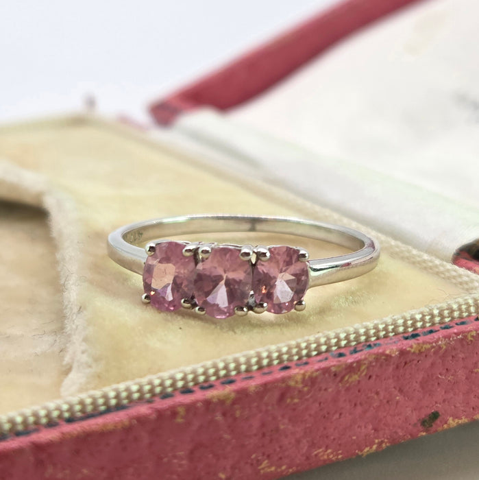 2860: Vintage 9ct White Gold Pink Sapphires Trilogy Ring