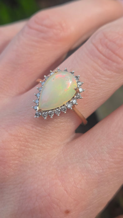 2899: Vintage 9ct Gold Pear Cut White Opal 21 Natural Diamonds Ring