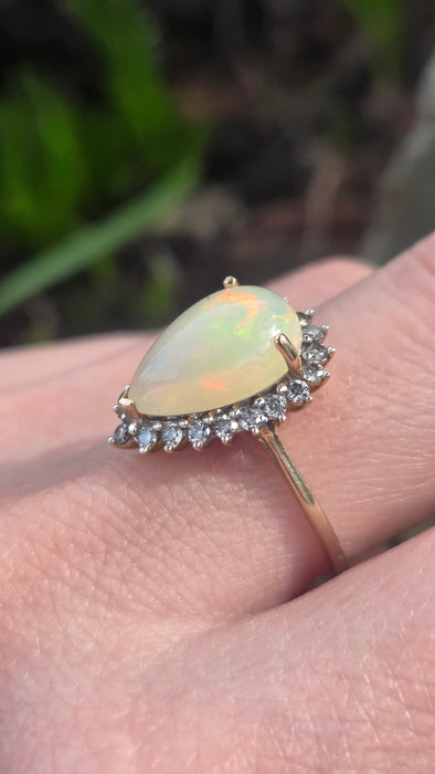 2899: Vintage 9ct Gold Pear Cut White Opal 21 Natural Diamonds Ring