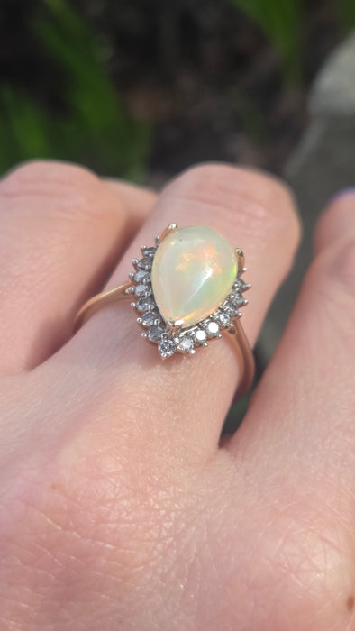 2899: Vintage 9ct Gold Pear Cut White Opal 21 Natural Diamonds Ring