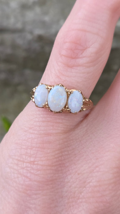 2983: Vintage Classic 9ct Gold White Opals Trilogy Rimg