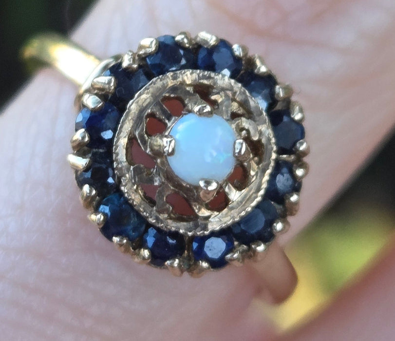 2858: Vintage 9ct Gold White Opal 12 Blue Sapphires Openwork Ring- From 1971