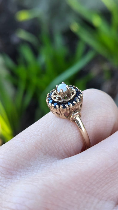 2858: Vintage 9ct Gold White Opal 12 Blue Sapphires Openwork Ring- From 1971