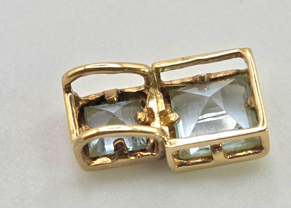 2888: Vintage & Petite 9ct Gold Blue Topaz Pendant