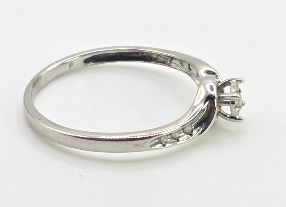 3032 Vintage: 9ct White Gold Seven Diamond Twist Ring