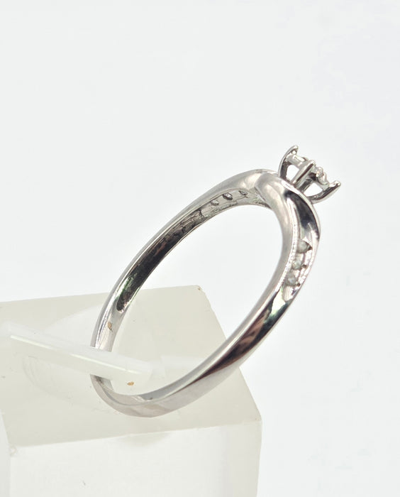 3032 Vintage: 9ct White Gold Seven Diamond Twist Ring