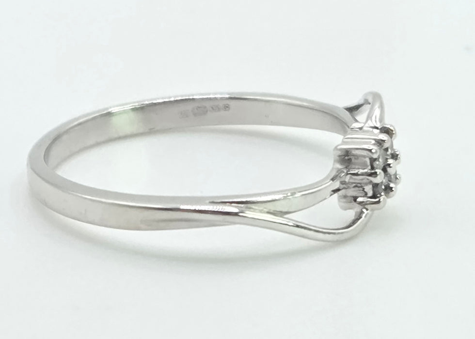 3031 Vintage: 9ct White Gold Four Diamond Cluster Bypass Ring