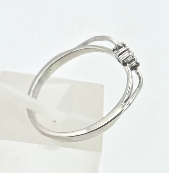 3031 Vintage: 9ct White Gold Four Diamond Cluster Bypass Ring