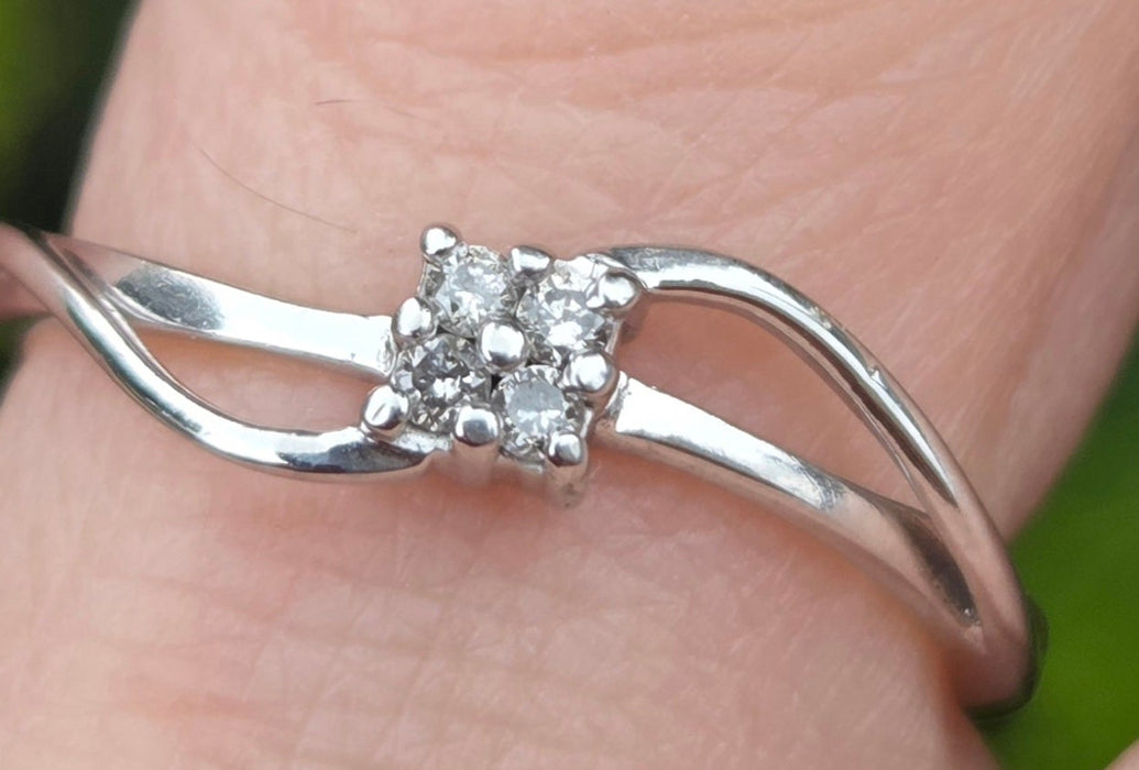 3031 Vintage: 9ct White Gold Four Diamond Cluster Bypass Ring