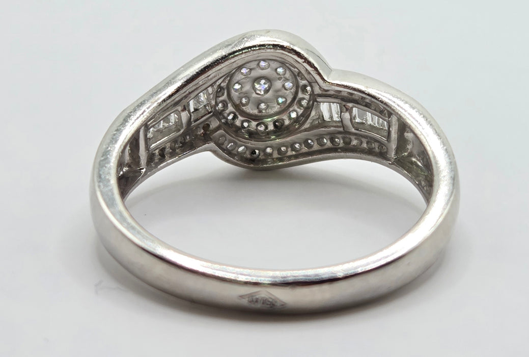 3162 Vintage: Platinum Diamond Round Cluster & Baguette Ring