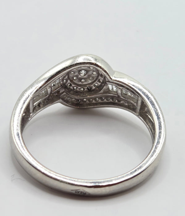 3162 Vintage: Platinum Diamond Round Cluster & Baguette Ring
