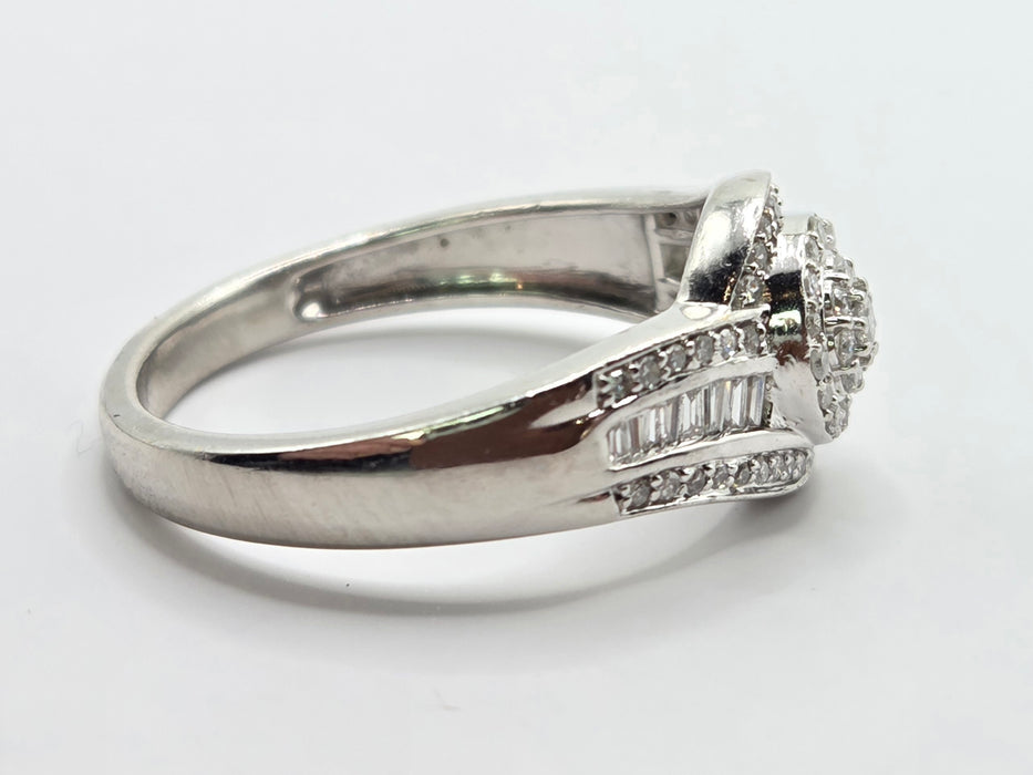 3162 Vintage: Platinum Diamond Round Cluster & Baguette Ring