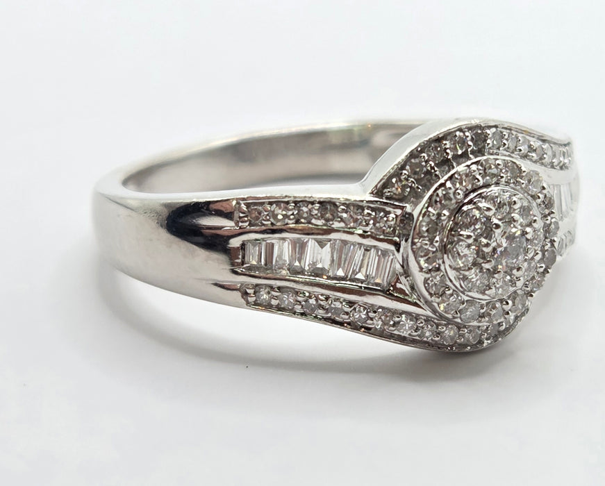 3162 Vintage: Platinum Diamond Round Cluster & Baguette Ring