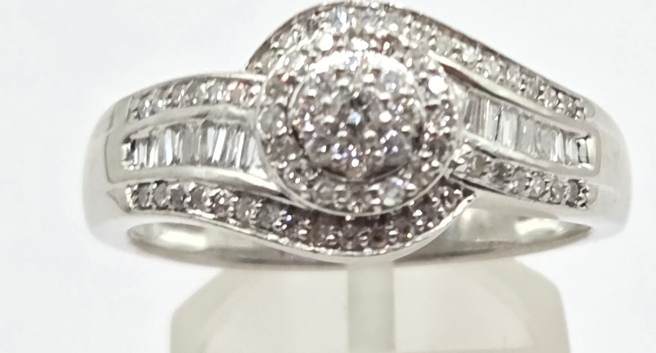 3162 Vintage: Platinum Diamond Round Cluster & Baguette Ring