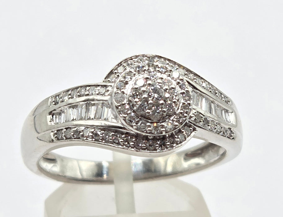 3162 Vintage: Platinum Diamond Round Cluster & Baguette Ring