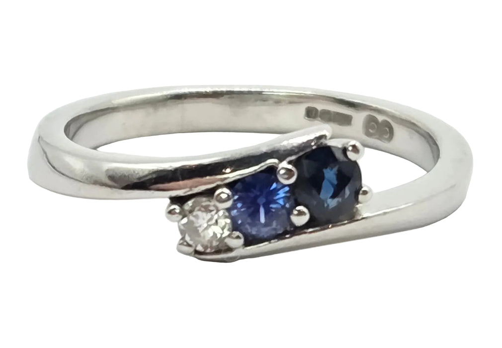 3165 Vintage: Platinum Blue Sapphire & Diamond Three-Stone Crossover Ring
