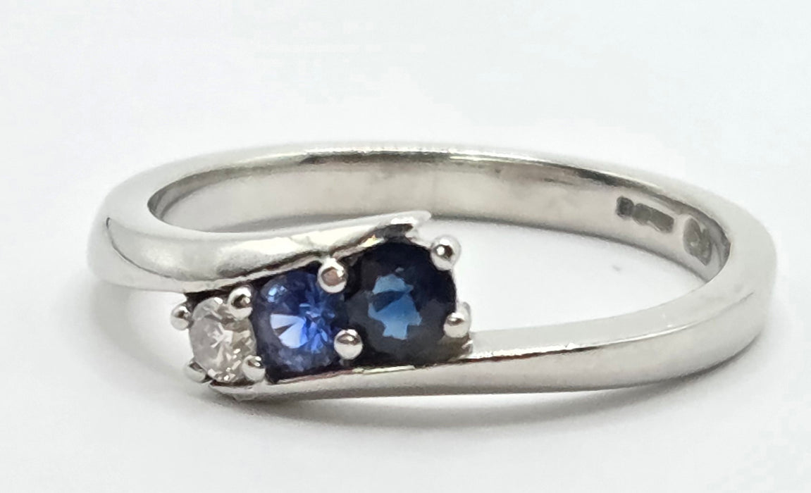 3165 Vintage: Platinum Blue Sapphire & Diamond Three-Stone Crossover Ring