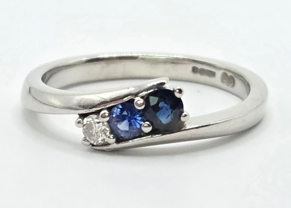 3165 Vintage: Platinum Blue Sapphire & Diamond Three-Stone Crossover Ring