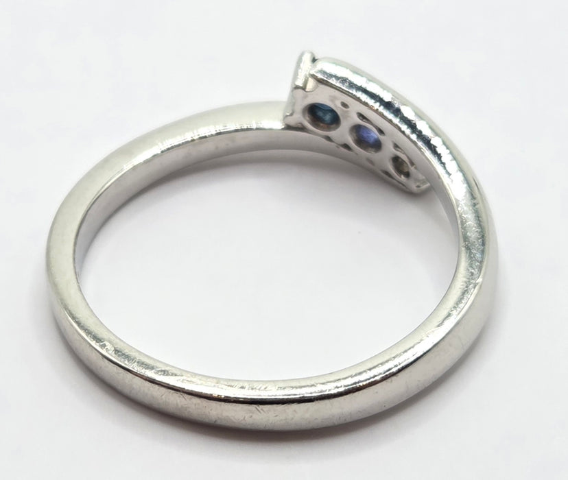 3165 Vintage: Platinum Blue Sapphire & Diamond Three-Stone Crossover Ring