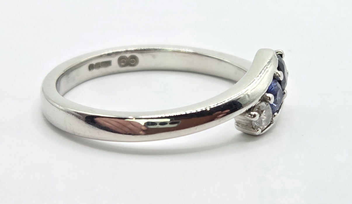 3165 Vintage: Platinum Blue Sapphire & Diamond Three-Stone Crossover Ring