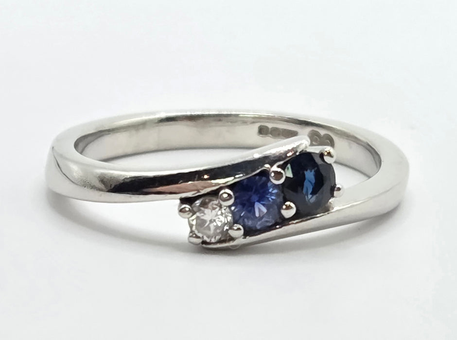 3165 Vintage: Platinum Blue Sapphire & Diamond Three-Stone Crossover Ring